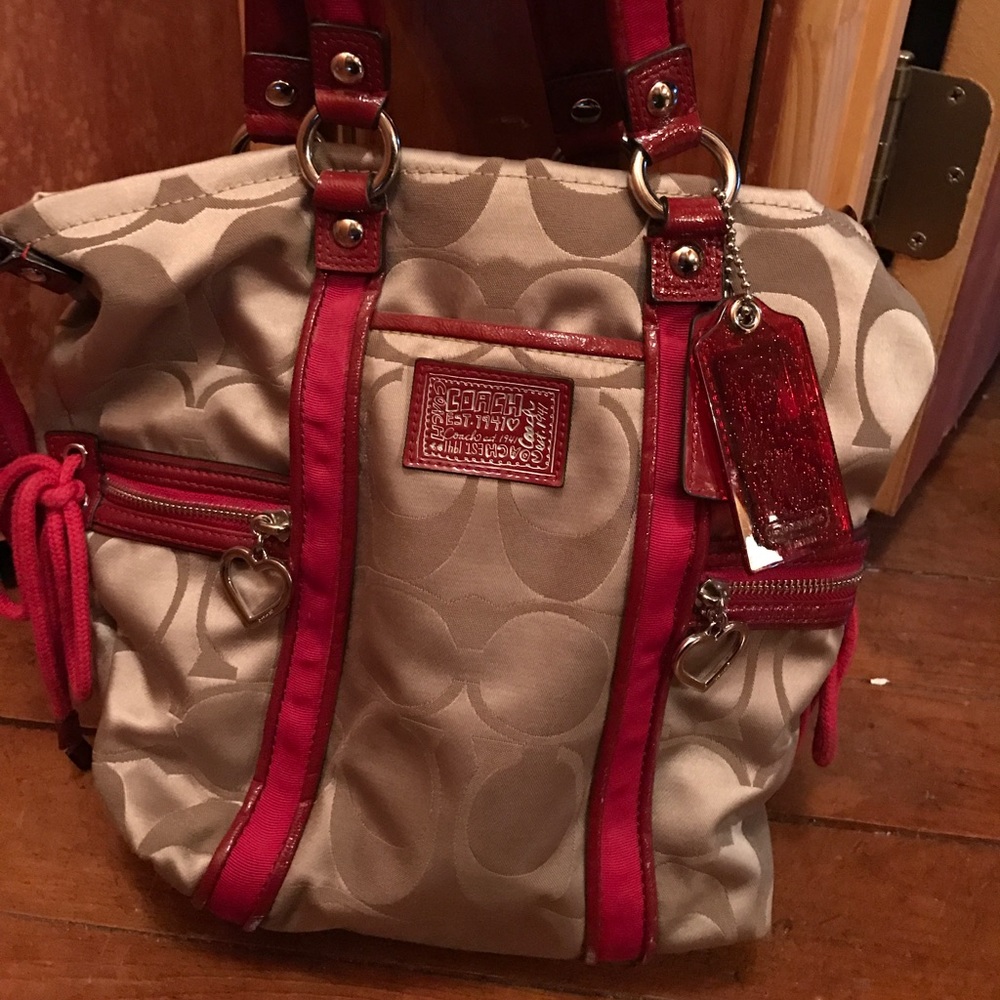 Coach purse with red trimming!